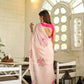 Elegant floral organza saree for women featuring delicate pink floral embroidery and a stylish back design
