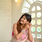 Elegant floral organza saree for women featuring delicate pink embroidery on a light fabric