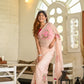 Elegant floral organza saree for women in soft pink with floral embroidery, styled for a festive look