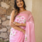 Floral pink saree for women featuring vibrant flower designs, perfect for festive occasions