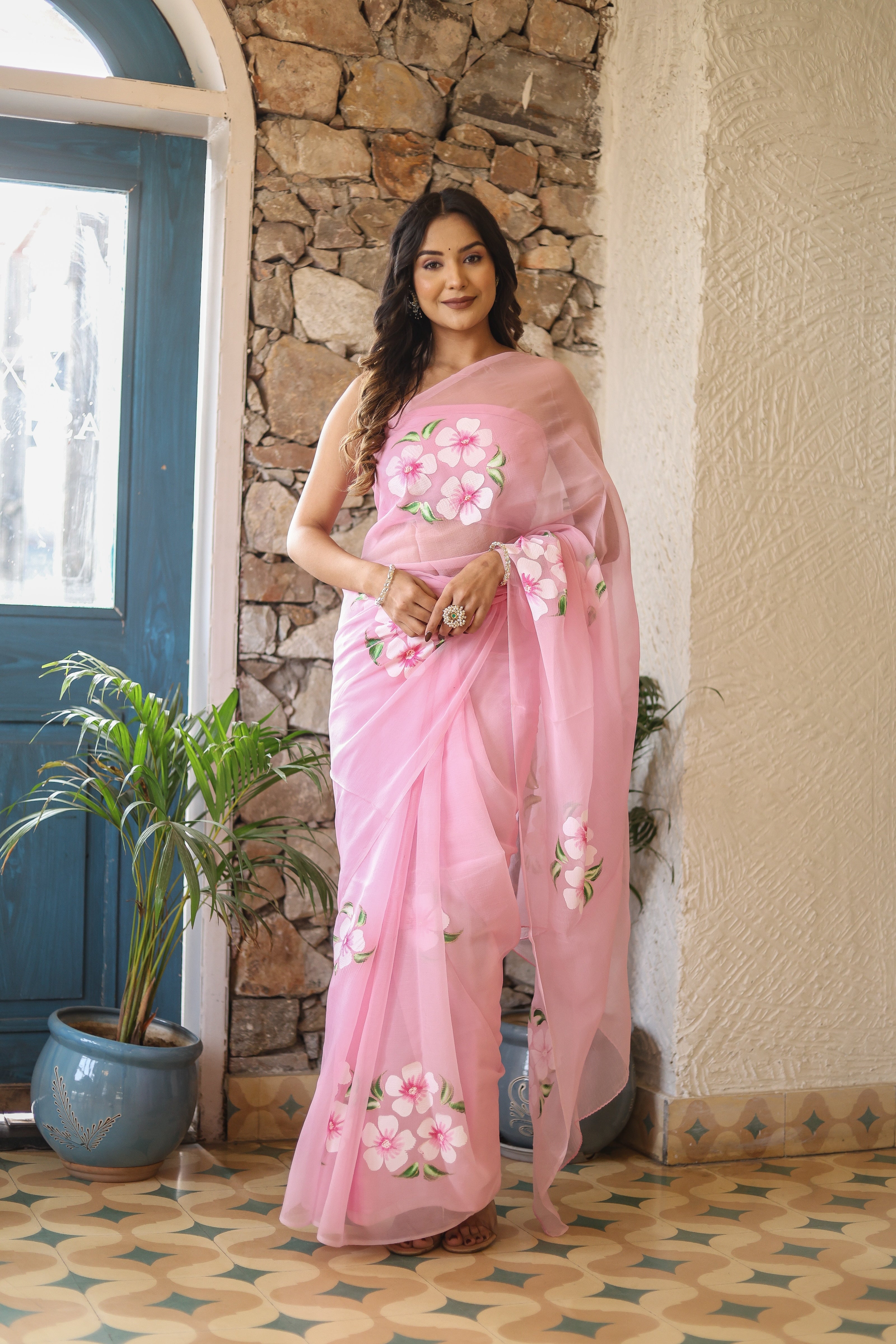 Elegant floral pink saree for women with beautiful floral embroidery, perfect for special occasions