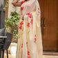 Floral print cream saree by Stylera, featuring vibrant red flowers on soft fabric