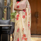Floral print cream saree by Stylera featuring vibrant pink flowers for stylish occasions
