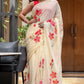 Floral print cream saree with vibrant pink flowers, perfect for festive occasions and elegant wear