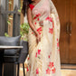 Elegant floral print cream saree with vibrant red flowers, perfect for festive occasions