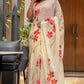 Elegant floral print cream saree with vibrant pink flowers for festive occasions