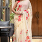 Elegant floral print cream saree featuring vibrant floral designs, perfect for festive occasions