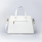 Stylish white floral print designer handbag with adjustable strap and gold accents