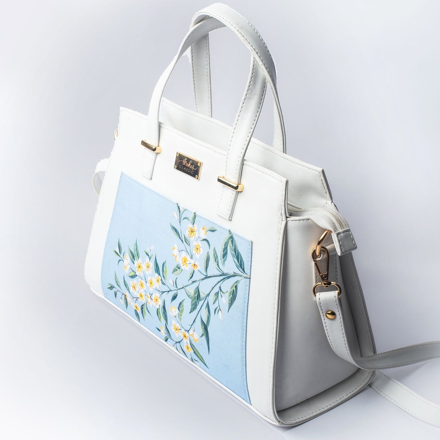 Stylera floral print designer handbag in white with floral design and stylish straps