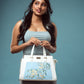 Elegant floral print designer handbag by Stylera with beautiful blue floral detailing