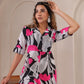 Floral print midi dress by Stylera featuring vibrant pink and black leaf patterns