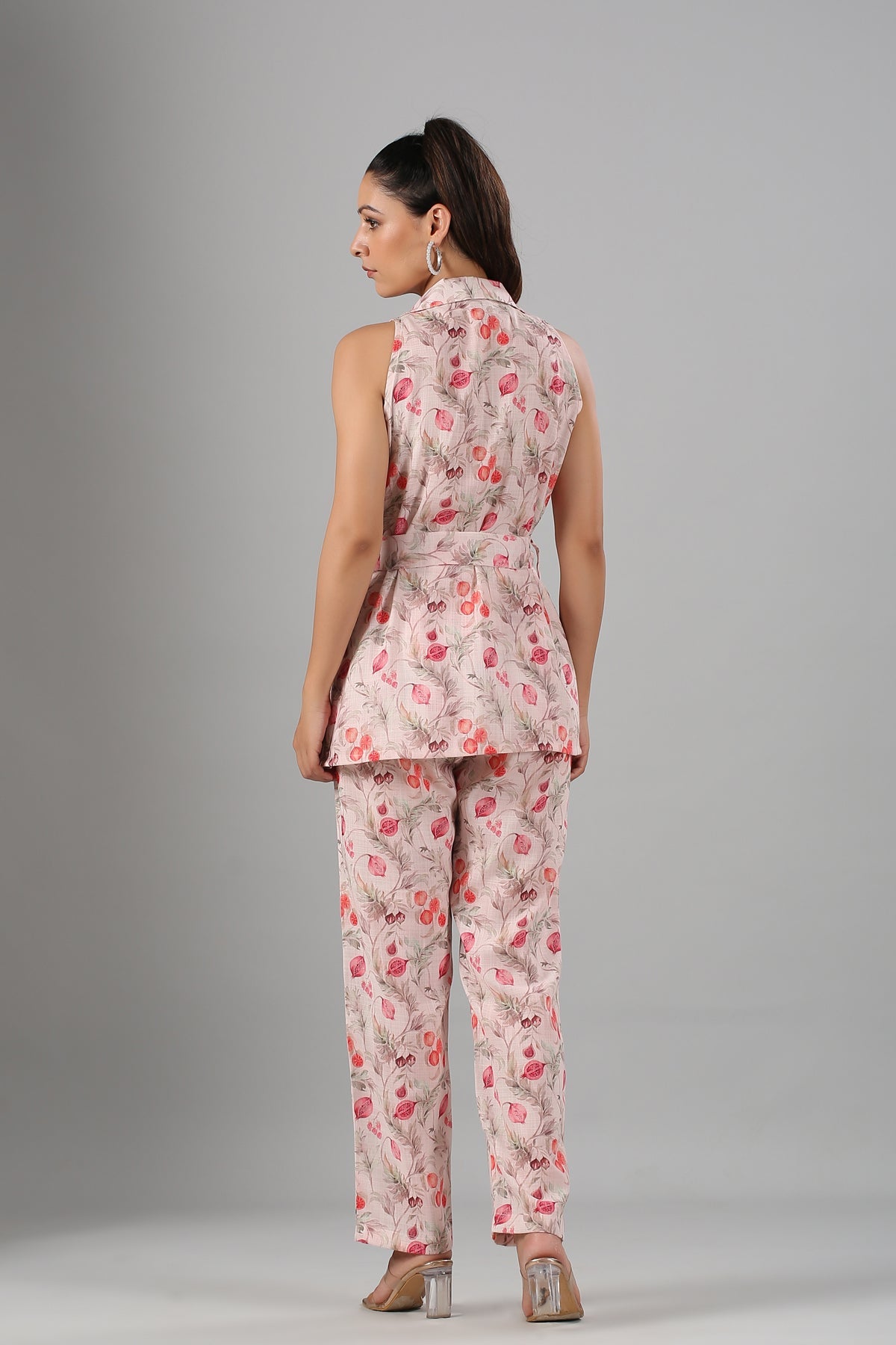 Back view of floral printed two piece set for women featuring a stylish top and matching pants