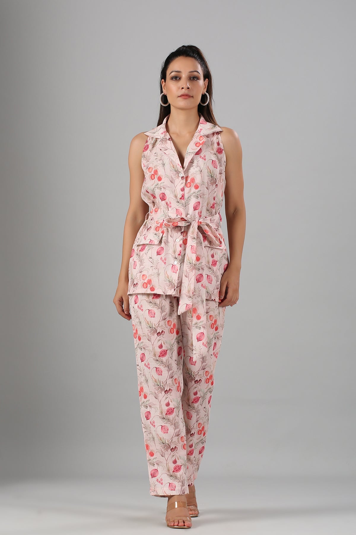 Floral printed two piece set for women featuring a sleeveless top and matching trousers