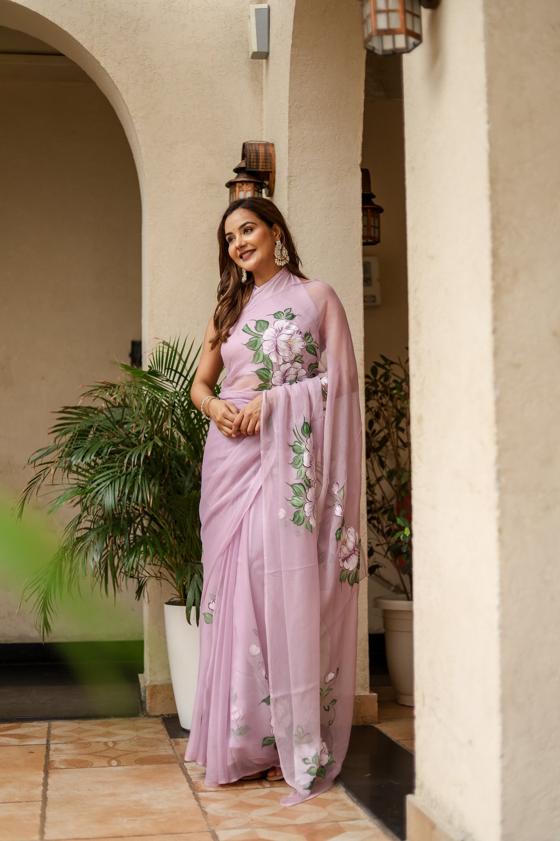 Elegant Stylera floral statement saree in soft pink with intricate floral embroidery