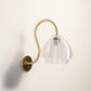 Sozori flower shaped wall light fixture with clear shade and brass arm for elegant home decor