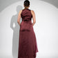 Elegant burgundy formal halter maxi gown for women with a flowing design and subtle train