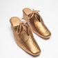 Stylera gold metallic heels designed as trendy slip-on shoes for women with a bow detail