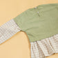 Stylera girls co-ord set featuring a green top with plaid sleeves for stylish young girls