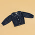 Cute girls denim jacket with a Peter Pan collar and button closure for stylish kids