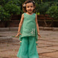 Girls firozi palazzo set featuring a stylish top and wide-leg pants in a vibrant green shade