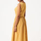 Stylera gold cotton corset dress sleeveless midi fit with pleated skirt worn by model