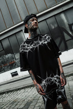 Urban streetwear styling featuring the gothic oversized tshirt with a drop shoulder boxy fit.