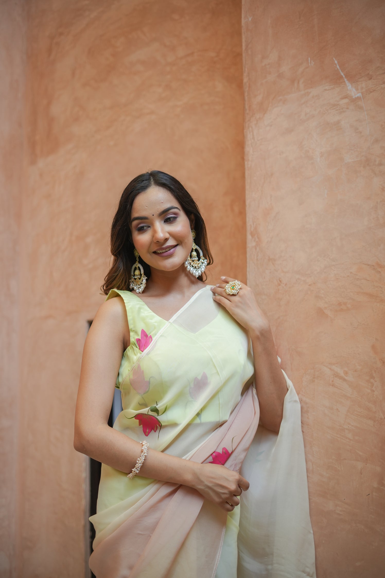 Stylera Graceful Tints floral saree in soft pastel hues with delicate floral embroidery