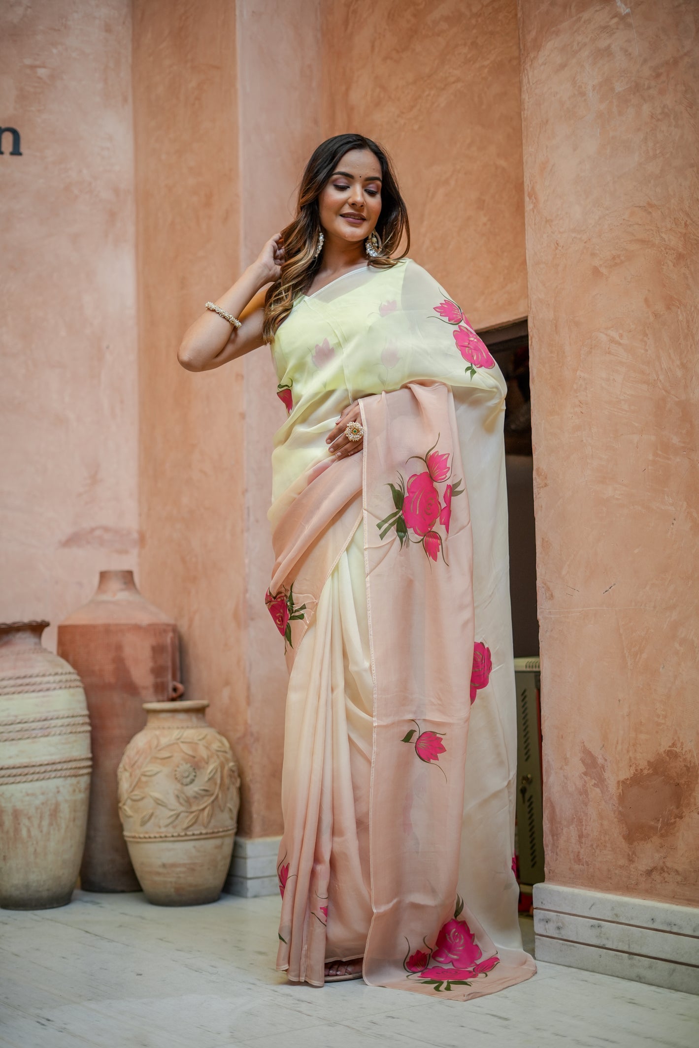 Stylera Graceful Tints floral saree featuring vibrant floral prints in pastel shades