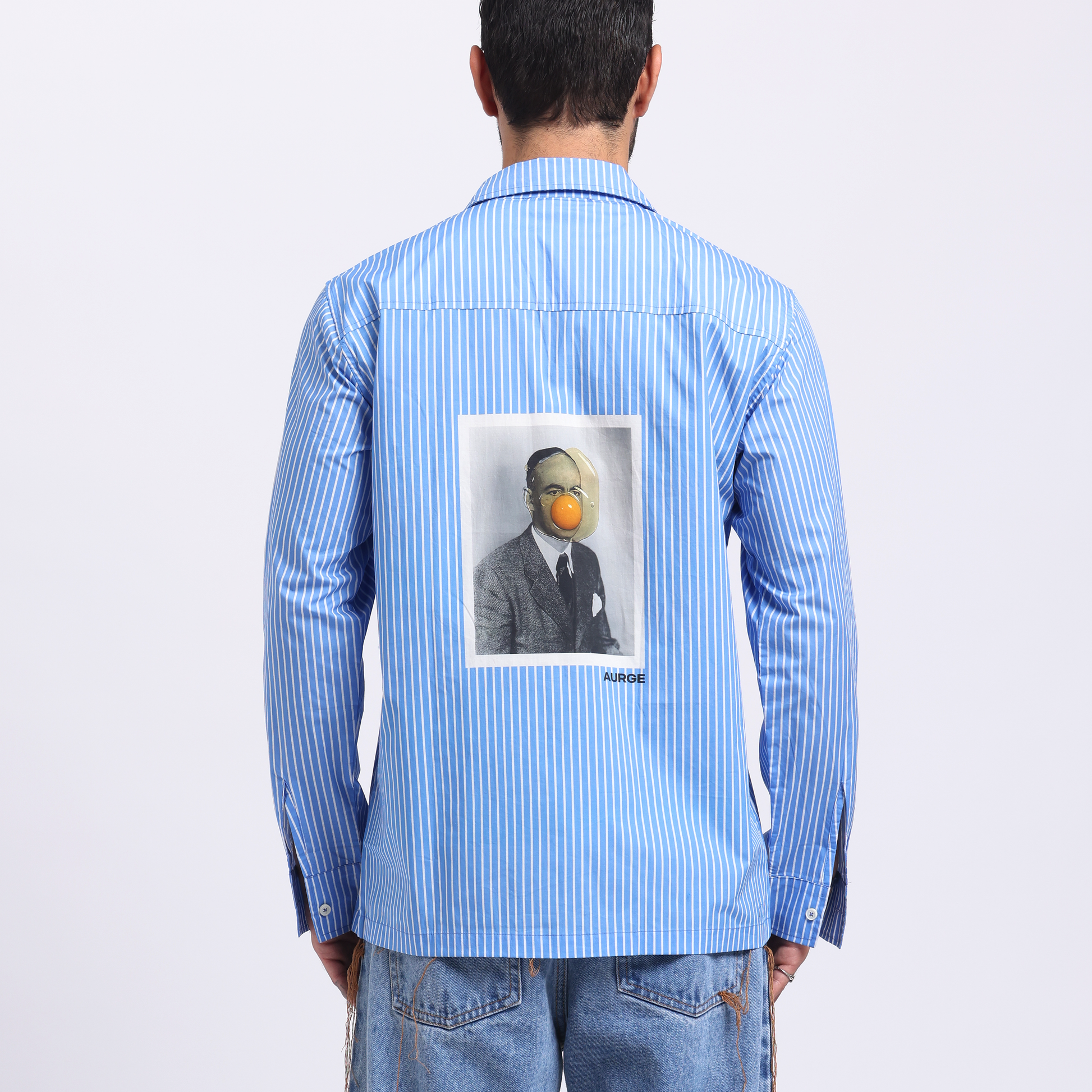 Stylera graphic striped casual shirt for men featuring a unique back print with a portrait and orange accessory