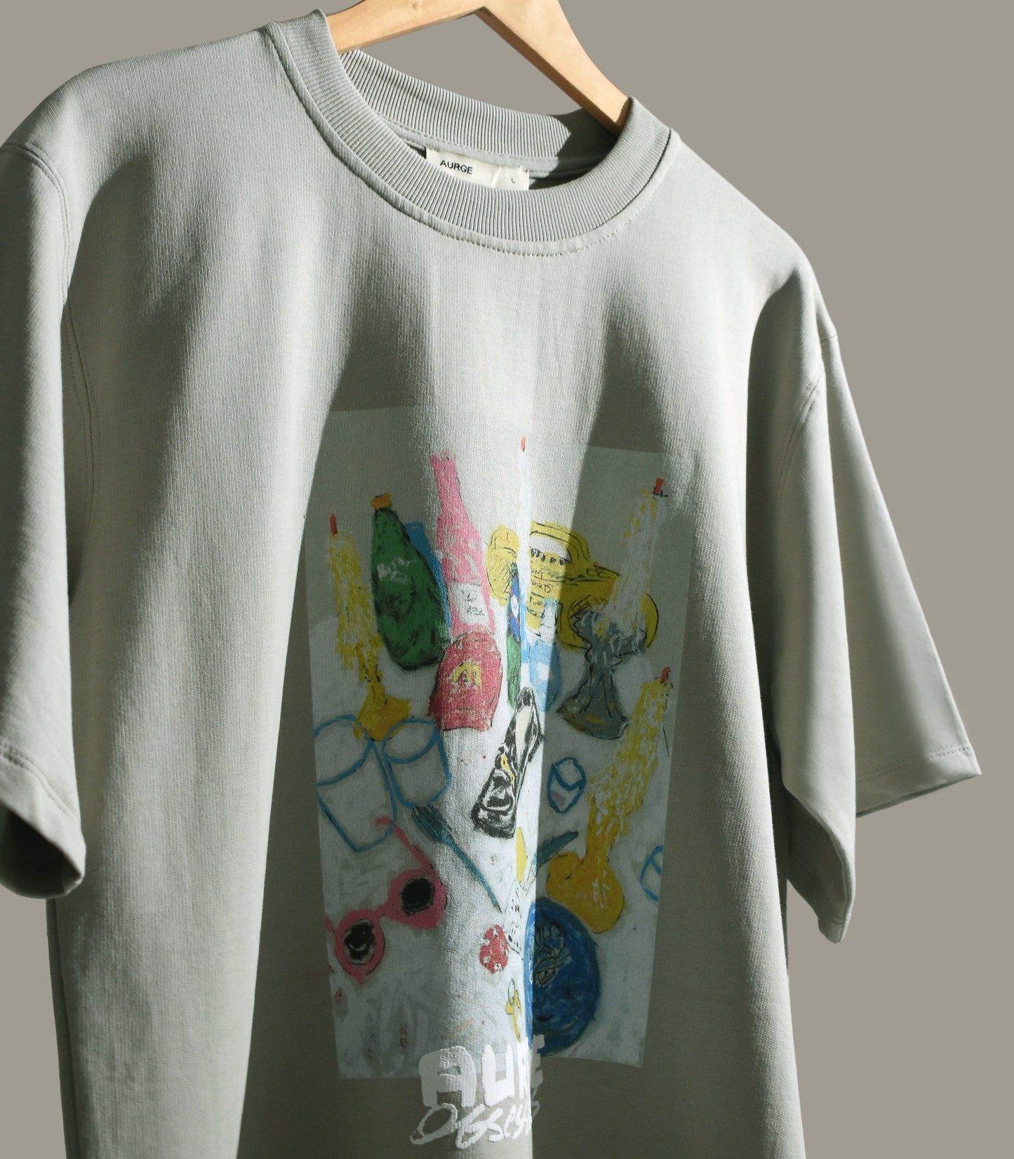 Stylera graphic t-shirt for men featuring a colorful print of bottles and glasses