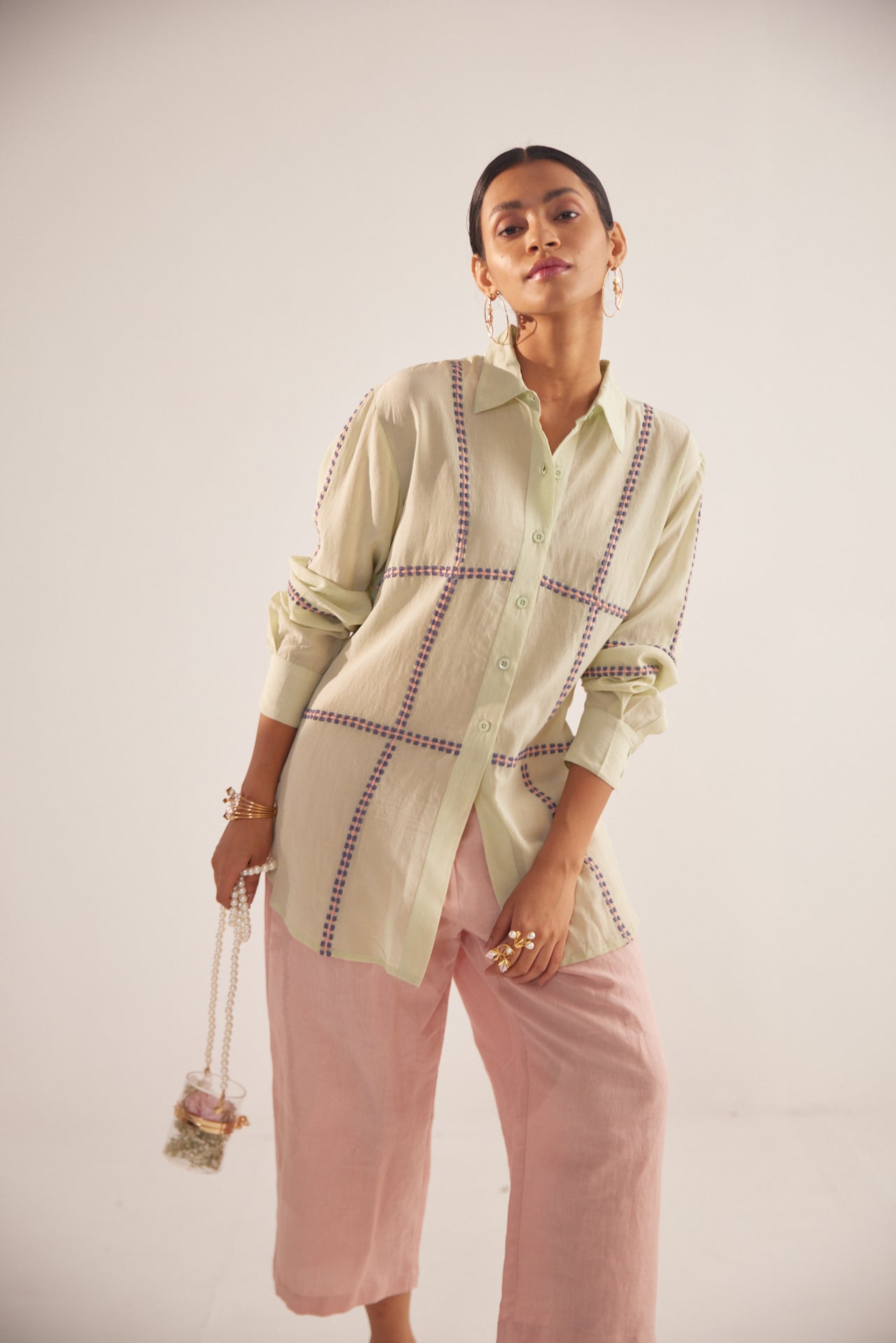Stylera green embroidered oversized shirt worn with pink wide-leg pants