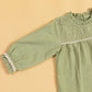 Stylera green girls dress with puffy sleeves and beautiful smocked detailing