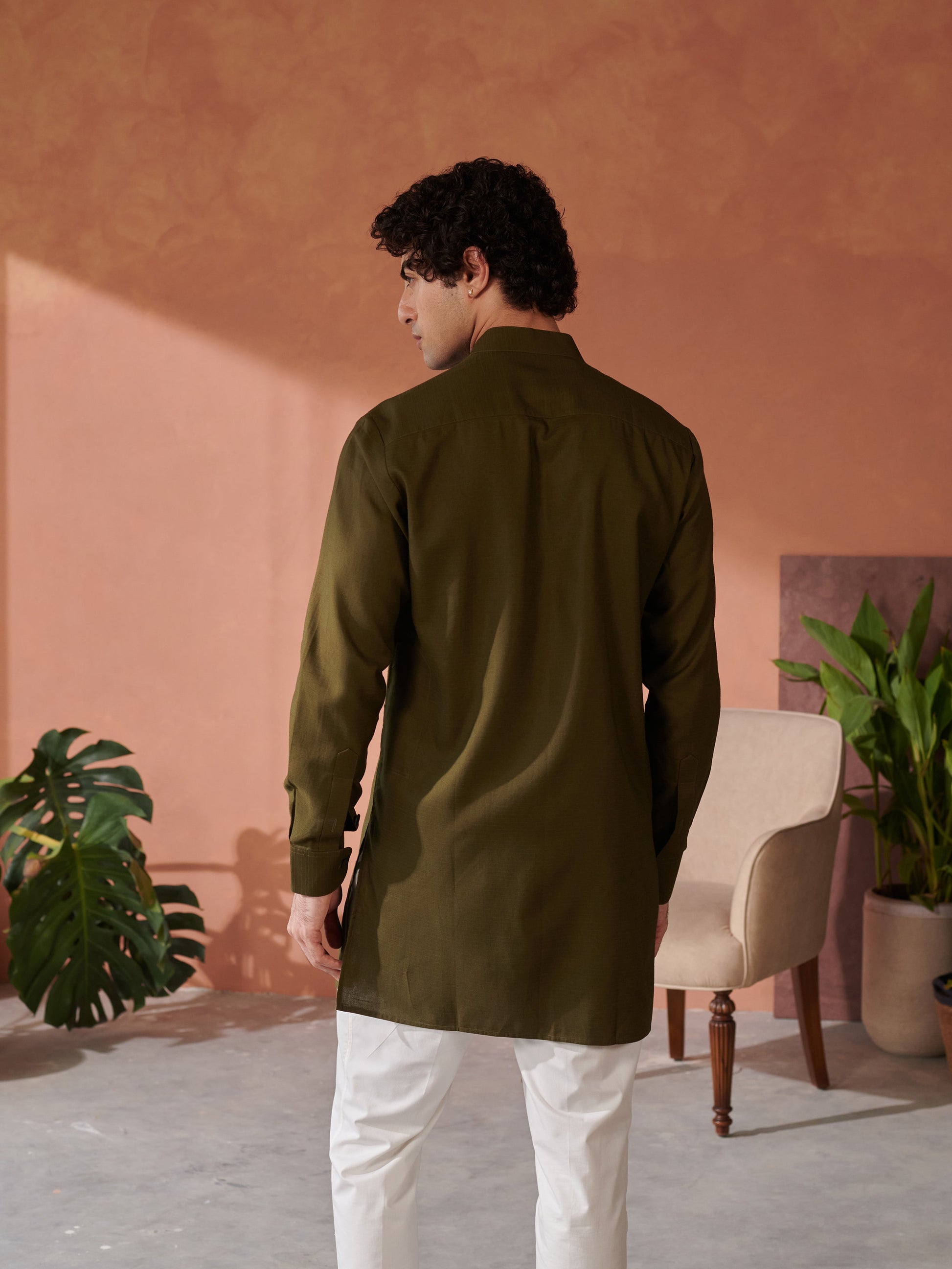 Stylish green Jodhpuri kurta from Stylera with a modern back design and comfortable fit