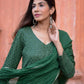 Elegant green three piece suit for women with detailed embroidery and matching dupatta by Stylera