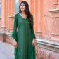 Elegant green three piece suit for women by Stylera featuring detailed embroidery and matching dupatta
