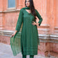 Elegant green three piece suit for women featuring detailed embroidery and matching dupatta by Stylera