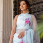 Elegant Stylera handcrafted saree with floral print in soft blue, styled with matching accessories