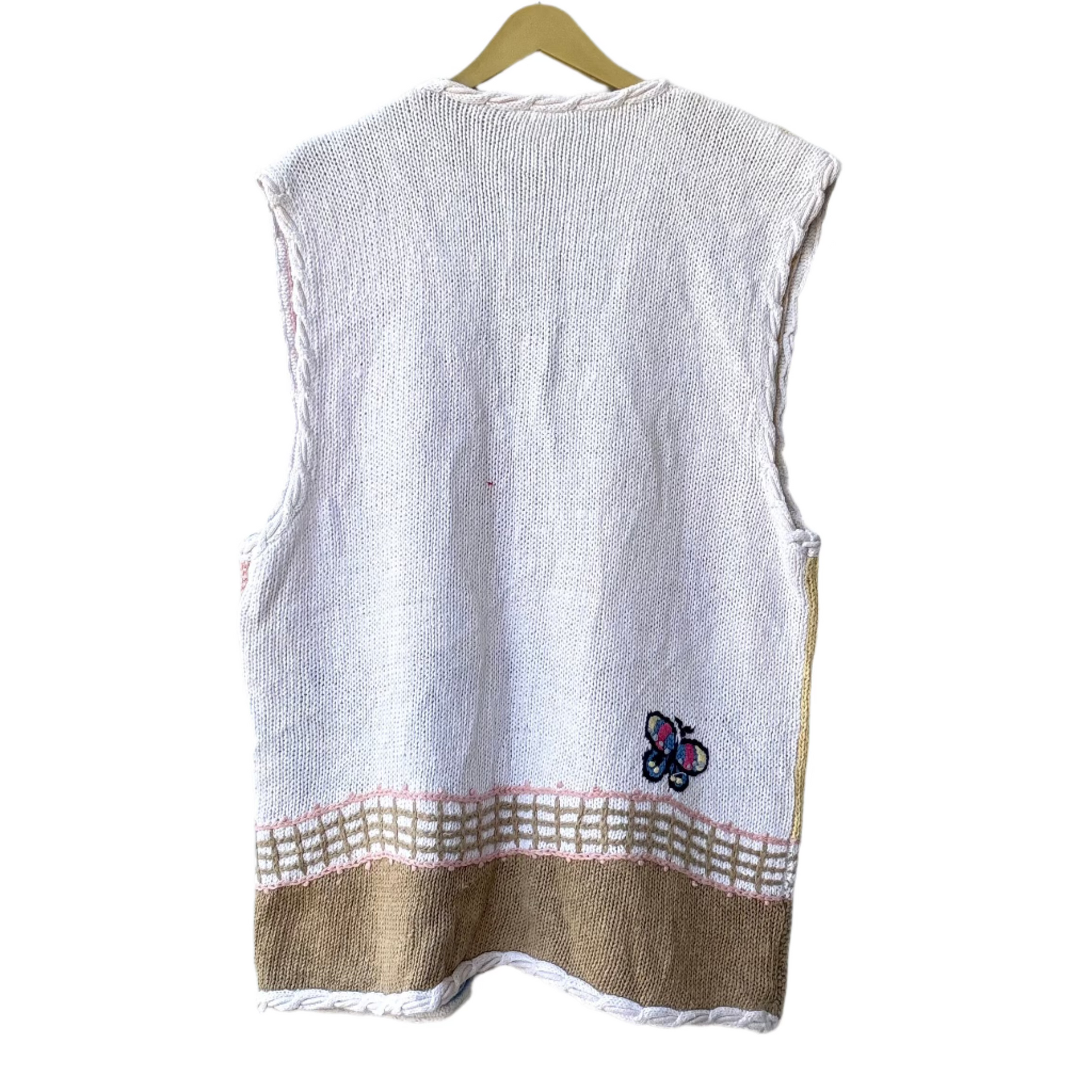 White sleeveless knit vest with beige hem pink check detail and butterfly embroidery on back colorful knit vest for women