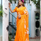 Elegant handpainted chiffon saree in vibrant orange with floral designs, perfect for festive occasions