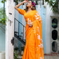 Stylera handpainted chiffon saree in vibrant orange with floral designs for elegant occasions