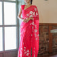 Elegant handpainted chiffon saree rani pink with floral designs, perfect for festive occasions