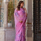 Elegant handpainted lavender chiffon saree adorned with intricate floral designs, perfect for festive occasions