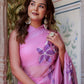 Elegant model wearing a handpainted lavender chiffon saree with floral designs and accessories