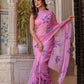 Model in a handpainted lavender chiffon saree with floral embroidery, showcasing elegance and style