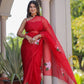 Elegant handpainted red organza saree by DiraByDimple with floral designs, perfect for festive occasions