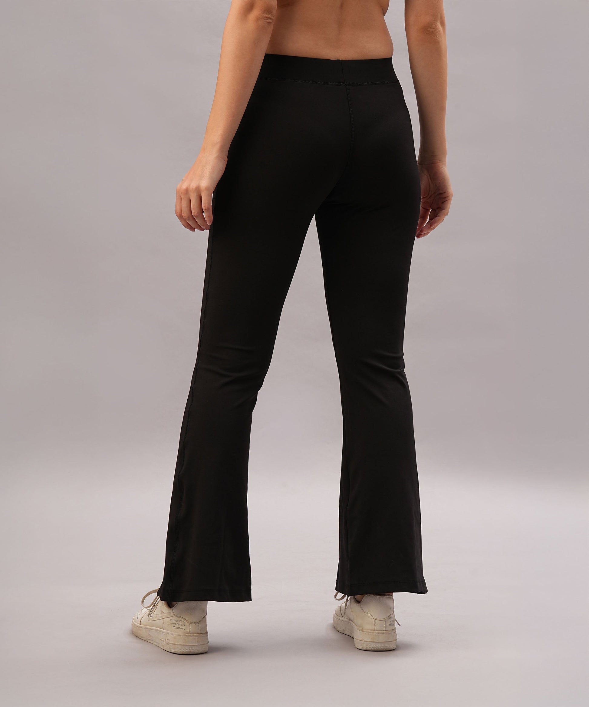 High waist black leggings for women with a flared design, perfect for stylish workouts and everyday wear