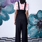 Back view of Stylera black dungaree with straps and wide legs high waist lace up overalls