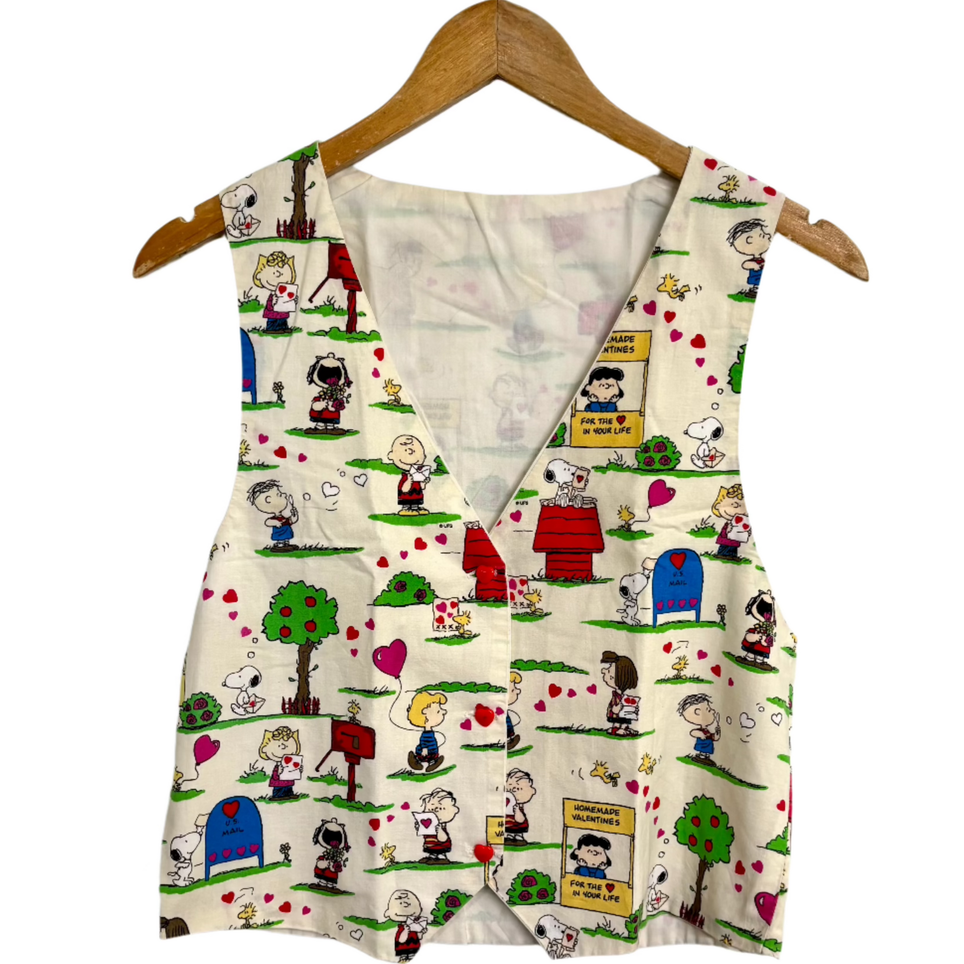 homemade valentines vest featuring Peanuts characters Snoopy and Charlie Brown hearts on cream