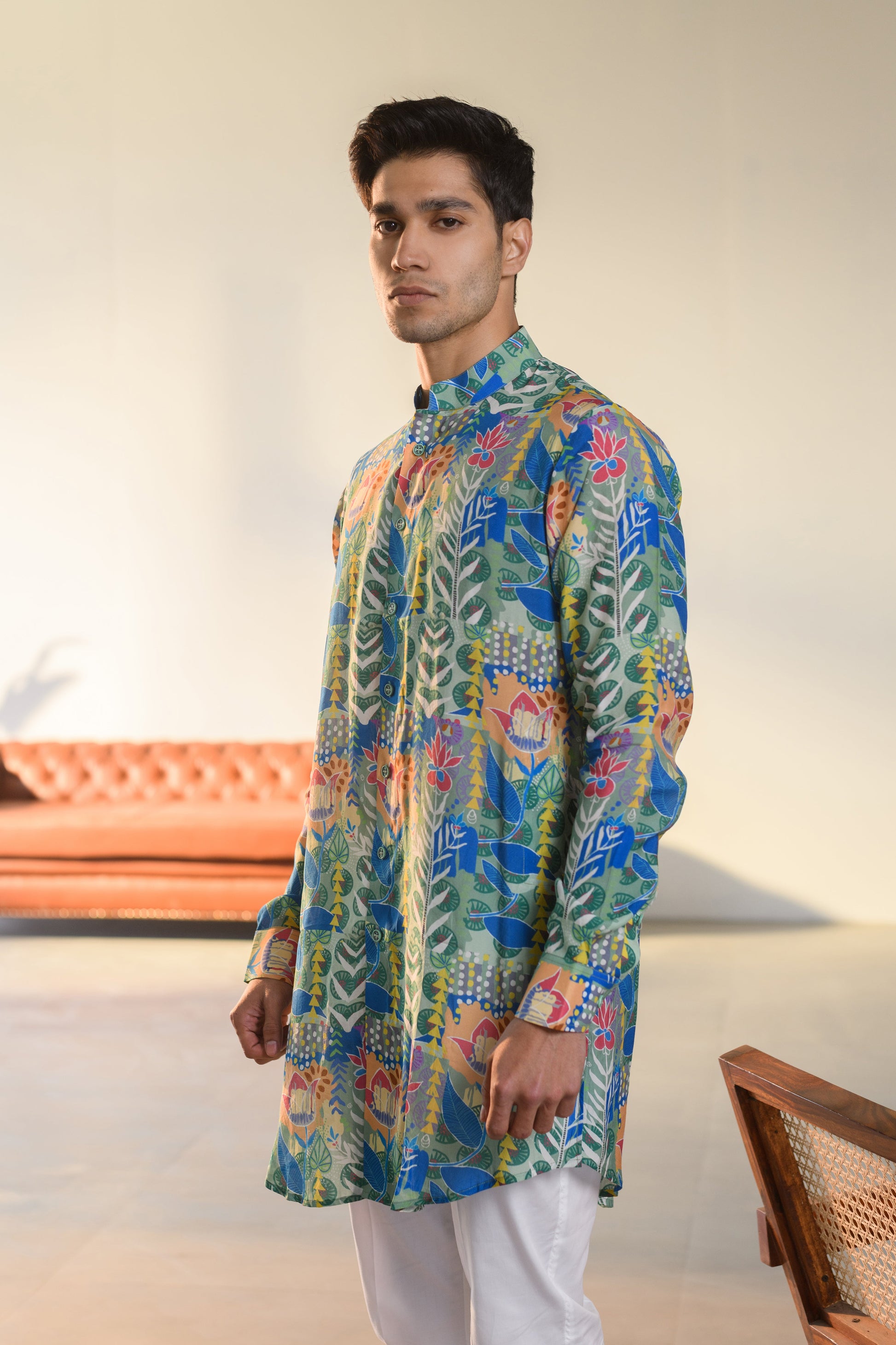 Justina blue floral kurta bandi set showcasing vibrant colors and intricate designs for formal occasions