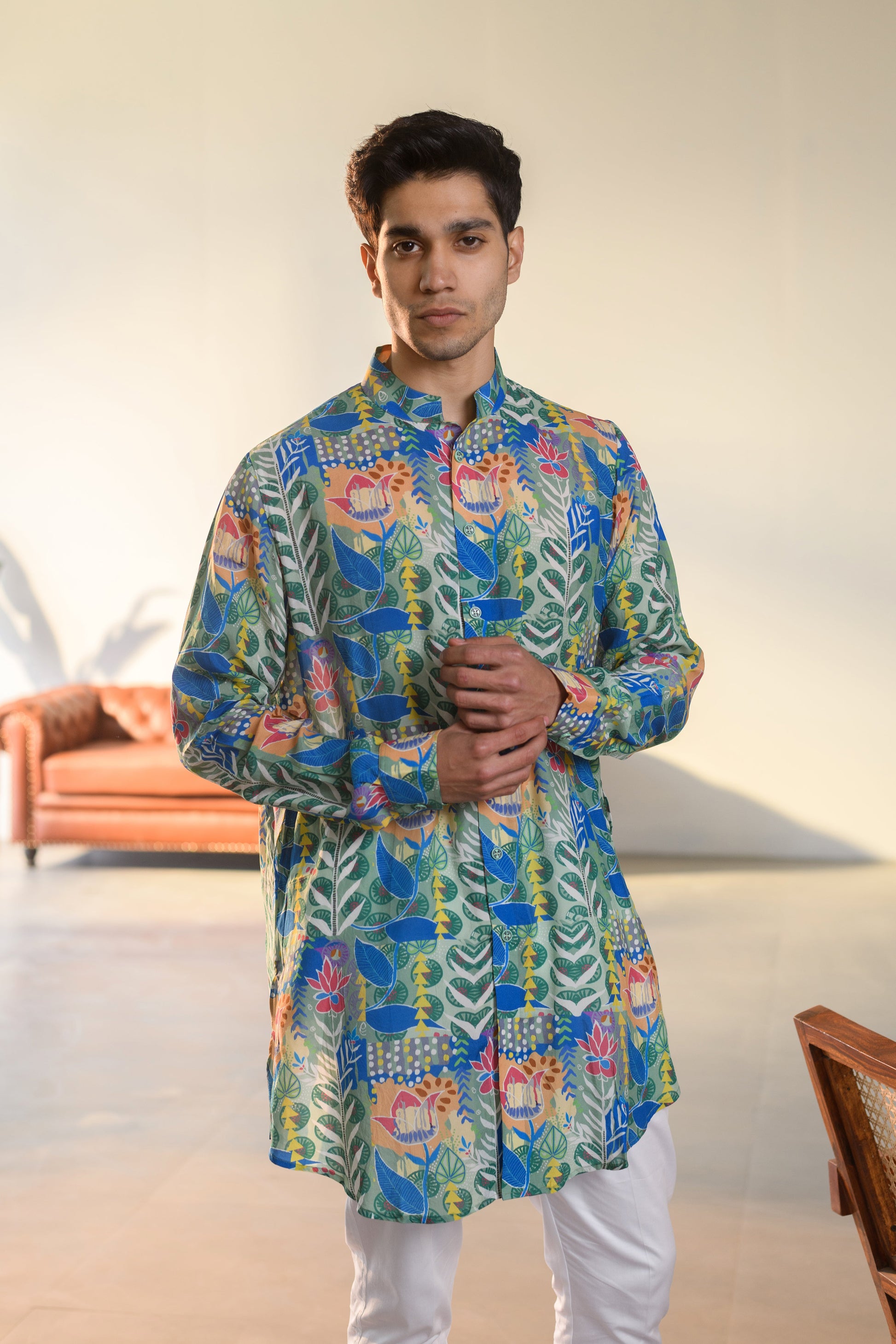 Justina blue floral kurta bandi set featuring vibrant floral patterns and a stylish collar